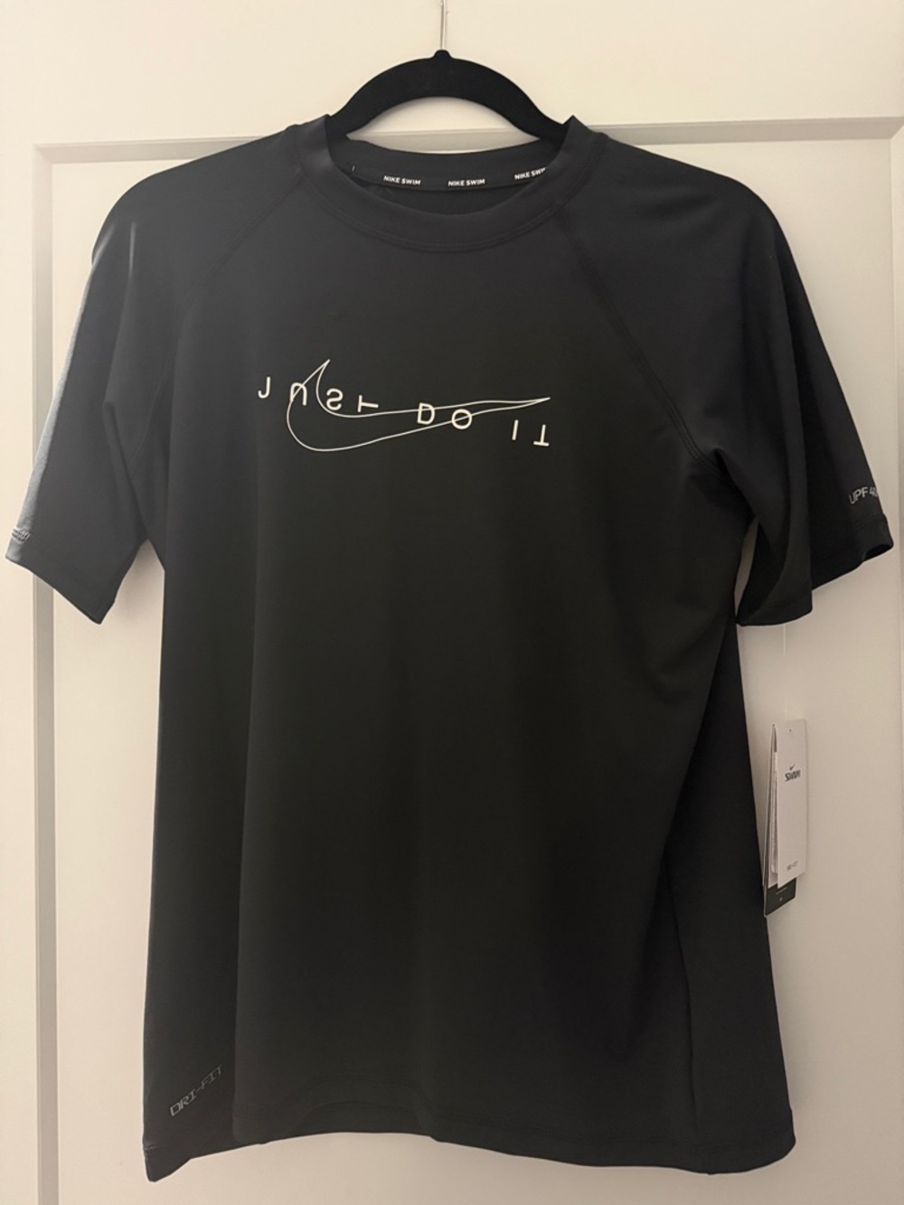Nike Black Short-Sleeve Performance Tee with White Swoosh Script